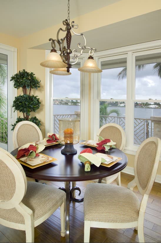 Three-Story Coastal Luxury Home with Balconies, Lanai, and Outdoor Kitchen