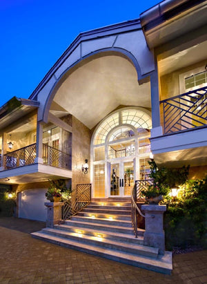 Three-Story Coastal Luxury Home with Balconies, Lanai, and Outdoor Kitchen