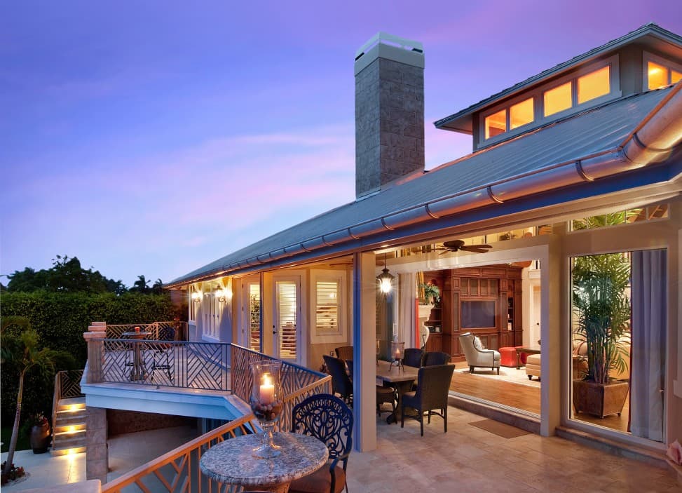 Three-Story Coastal Luxury Home with Balconies, Lanai, and Outdoor Kitchen