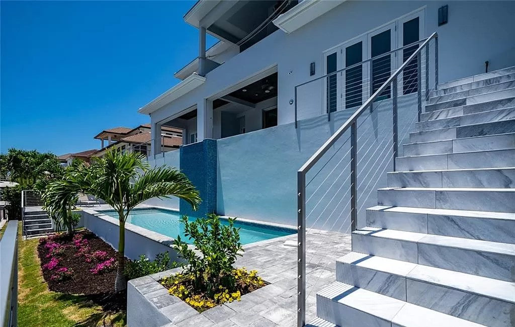 Luxury 4-Bedroom Home with Elevator, Dual Master Suites, and Lanai