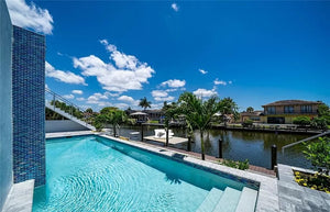 Luxury 4-Bedroom Home with Elevator, Dual Master Suites, and Lanai