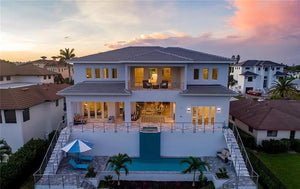Luxury 4-Bedroom Home with Elevator, Dual Master Suites, and Lanai