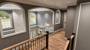 Spacious 5-bedroom home with grand foyer and outdoor living areas.