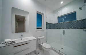 Luxury 4-Bedroom Home with Elevator, Dual Master Suites, and Lanai