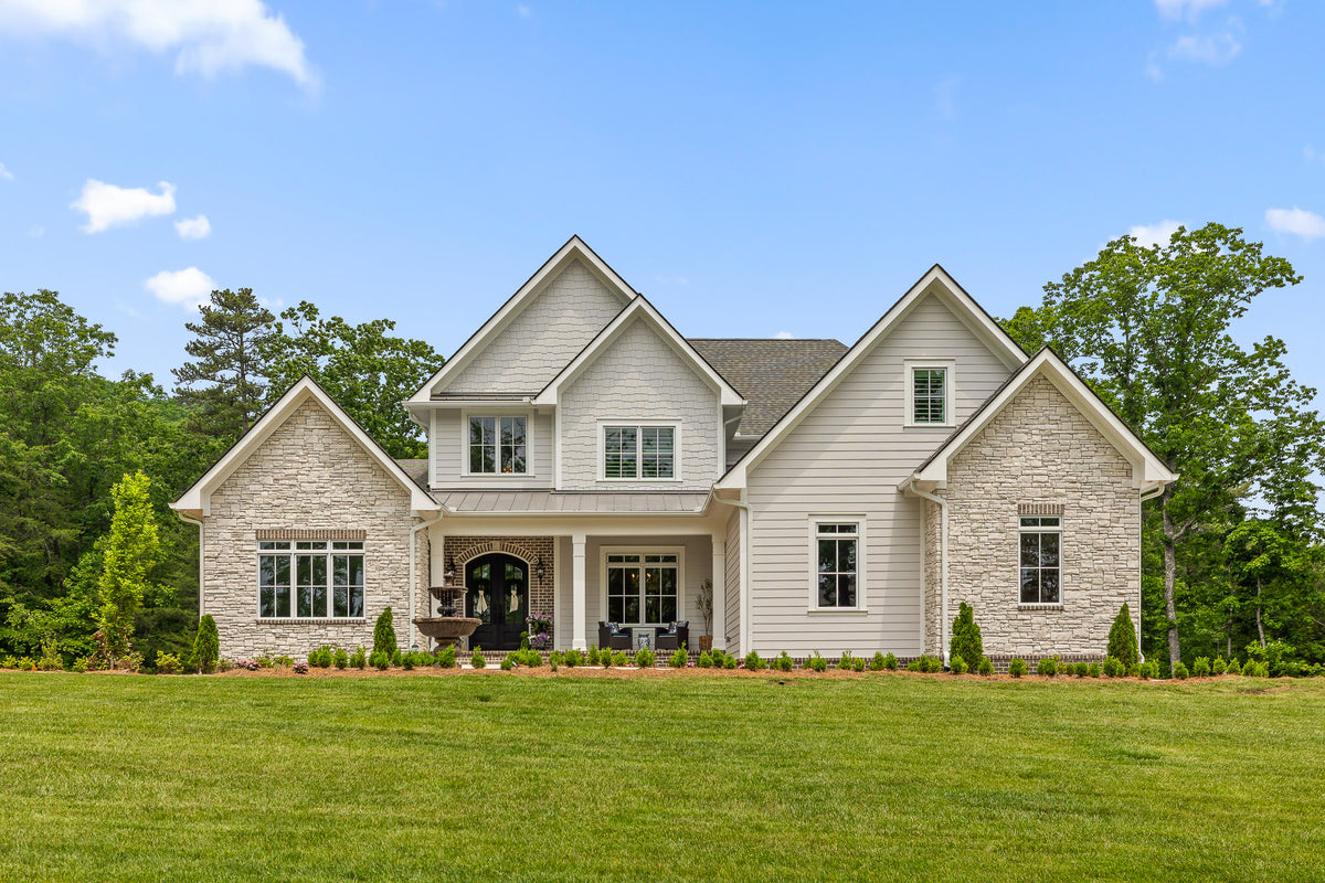 Luxury 4-Bedroom House Plan with Bonus Room and Sunroom