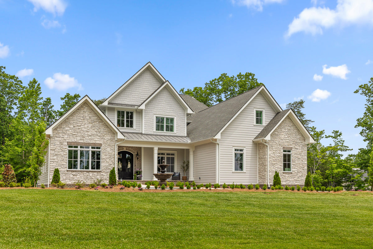 Luxury 4-Bedroom House Plan with Bonus Room and Sunroom