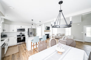 1,703 Sq Ft 4-Bedroom House Plan with Porch & Fireplace