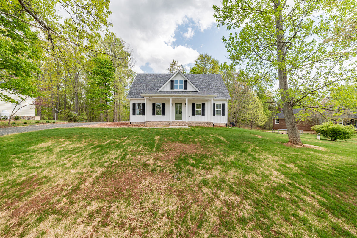 1,703 Sq Ft 4-Bedroom House Plan with Porch & Fireplace