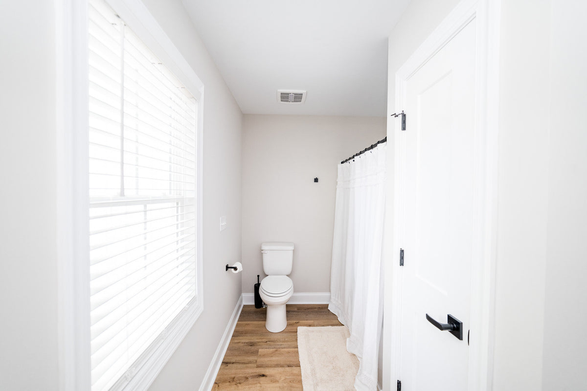 1,703 Sq Ft 4-Bedroom House Plan with Porch & Fireplace