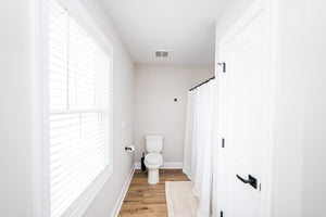 1,703 Sq Ft 4-Bedroom House Plan with Porch & Fireplace