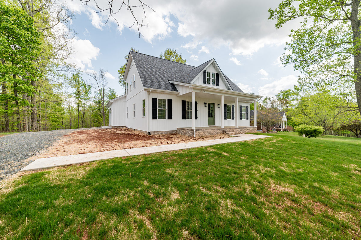 1,703 Sq Ft 4-Bedroom House Plan with Porch & Fireplace