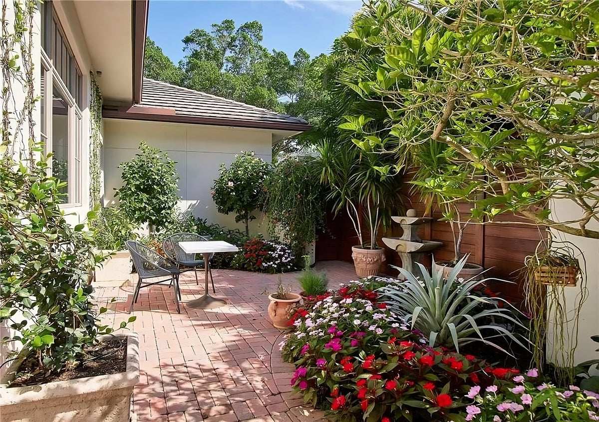 Single-Story Luxury Home with Outdoor Kitchen, Great Room, and Vaulted Ceilings